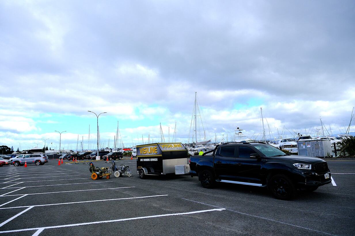 Organized car park with yellow lines
